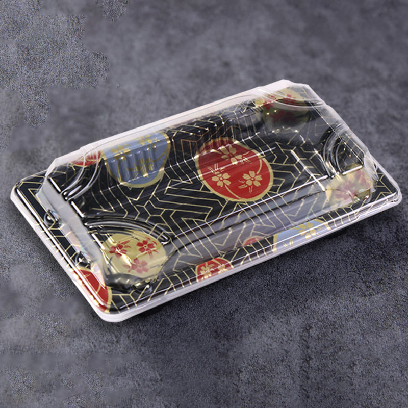 08 rectangular black plastic sushi tray container on grey table background, disposable sushi tray for meals
