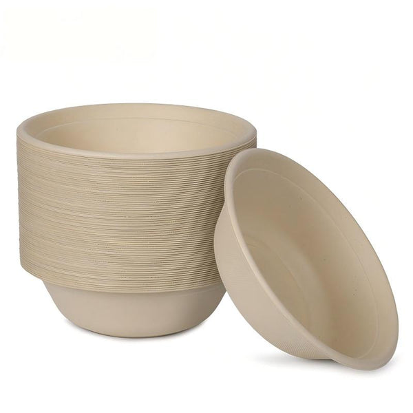 A stack of round beige bowls with one bowl leaning against the stack on a clean white background.