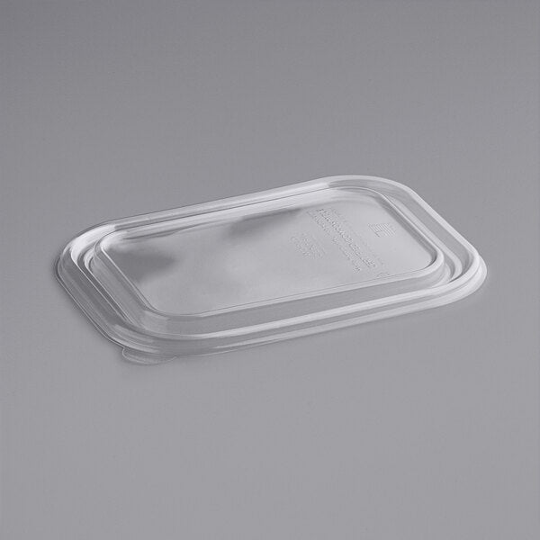 Clear PET plastic lids for 36 oz rectangular fiber food containers on grey background, tight fit takeout container lids