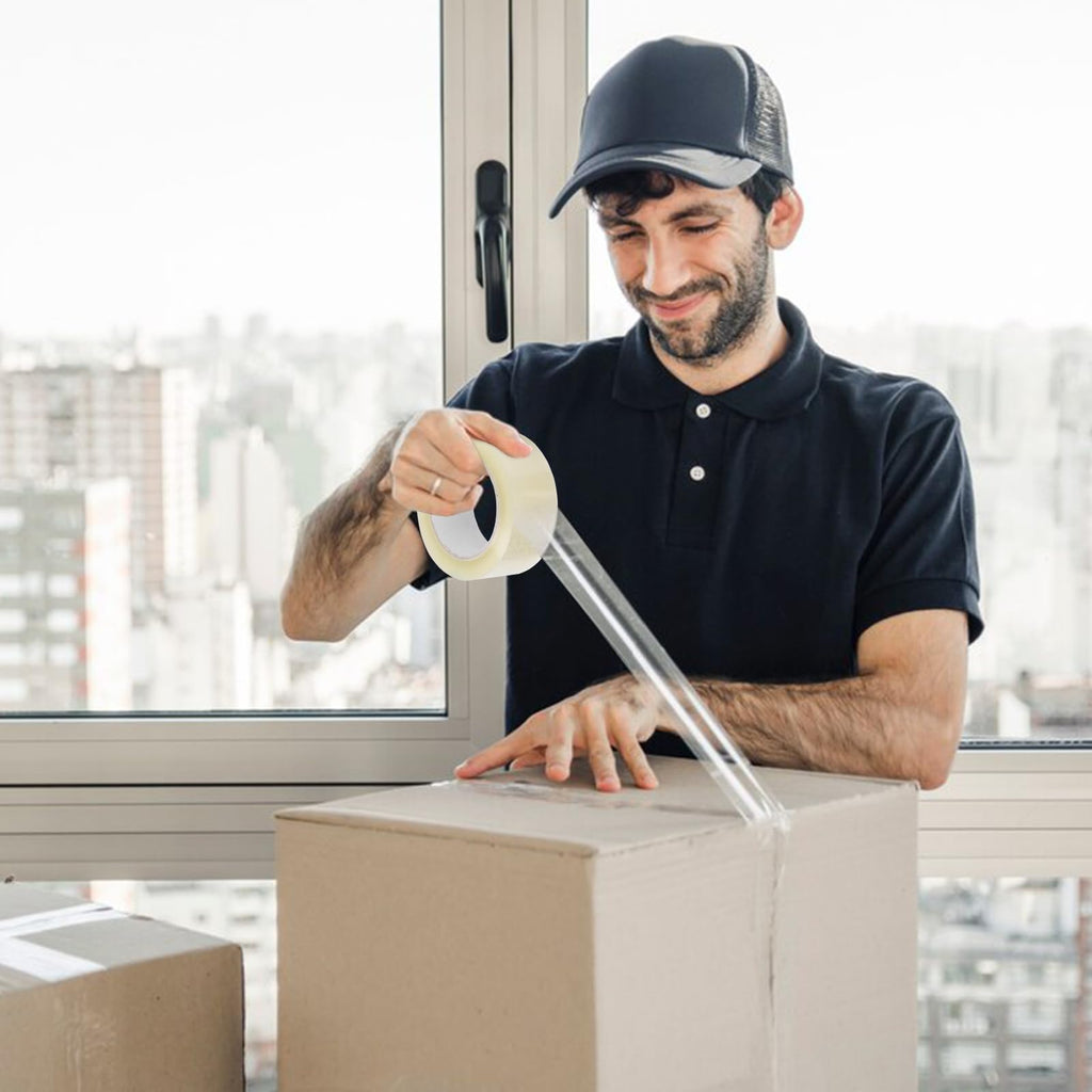 Clear packing tape sealing e-commerce packages and shipping boxes